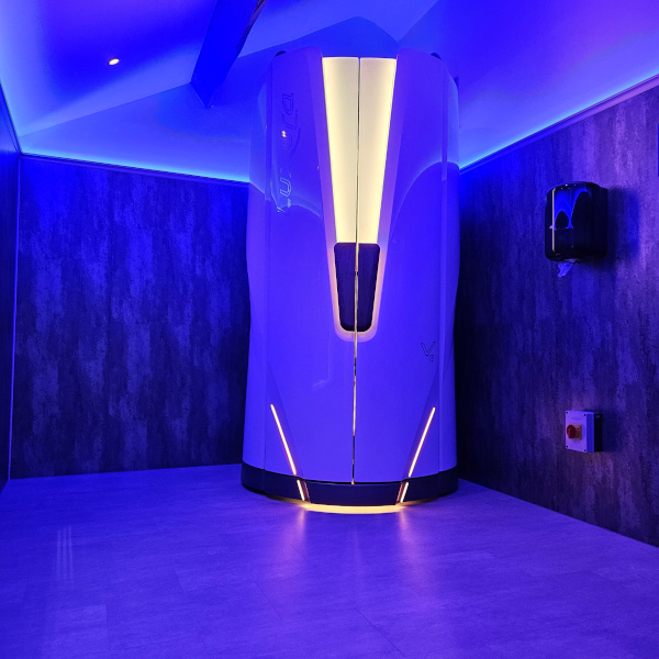 Modern tanning equipment at Q-TAN salon following refurbishment and audio installation