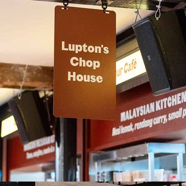 Professional AUDAC speaker installation above the food hall at White Cloth Hall Leeds