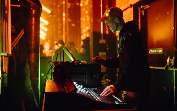 Audioserv sound engineer operating professional audio equipment at Testbed Leeds