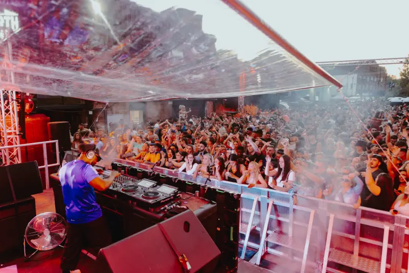 Cru2 Leeds Shutdown - DJ performing to a packed crowd at Springwell Brewery